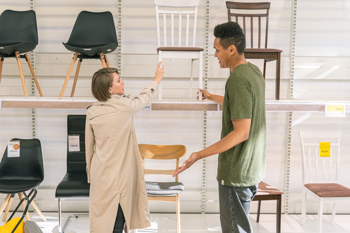 Man and Woman in Furniture Shop