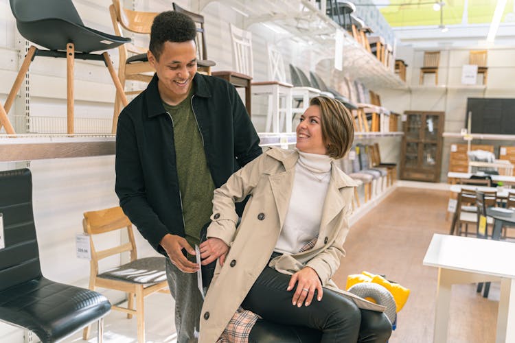 Man And Woman In Furniture Shop 