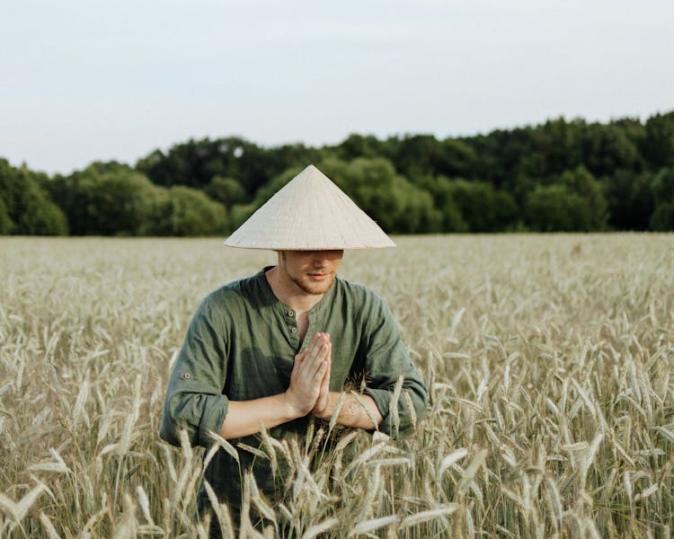 A Person Wearing Coolie Hat