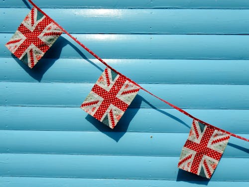 Ingyenes stockfotó bannerek, brit zászló, kék fal témában Stockfotó