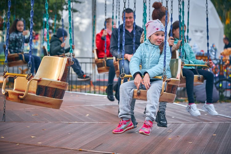 People On A Swing Ride