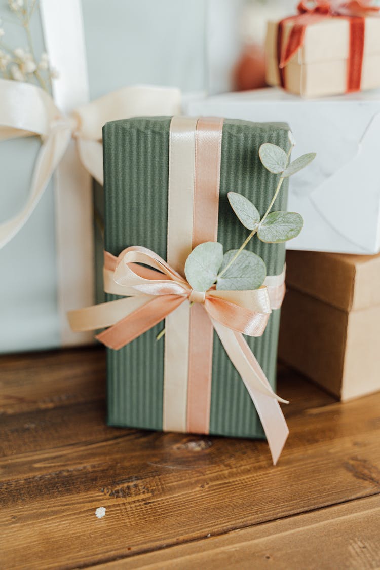 A Gift With Ribbon And Leaves 