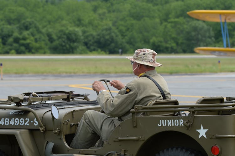 Man Driving A Military Vehicle