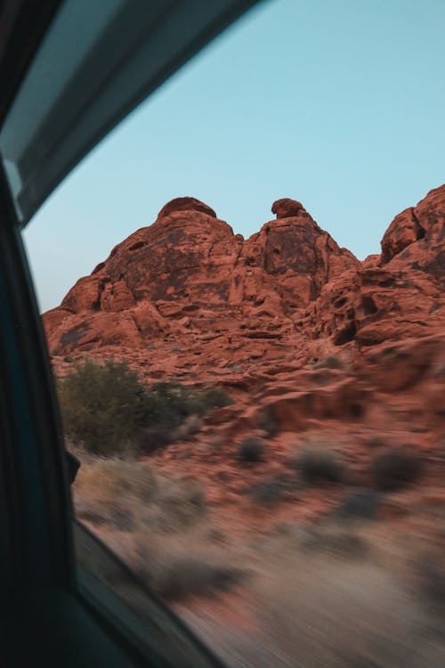 Rocky formations through window of car