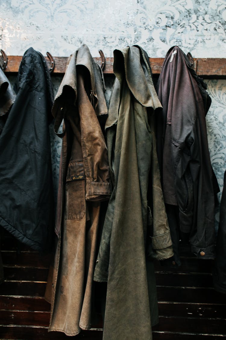 Clothes Hanging On Wooden Board