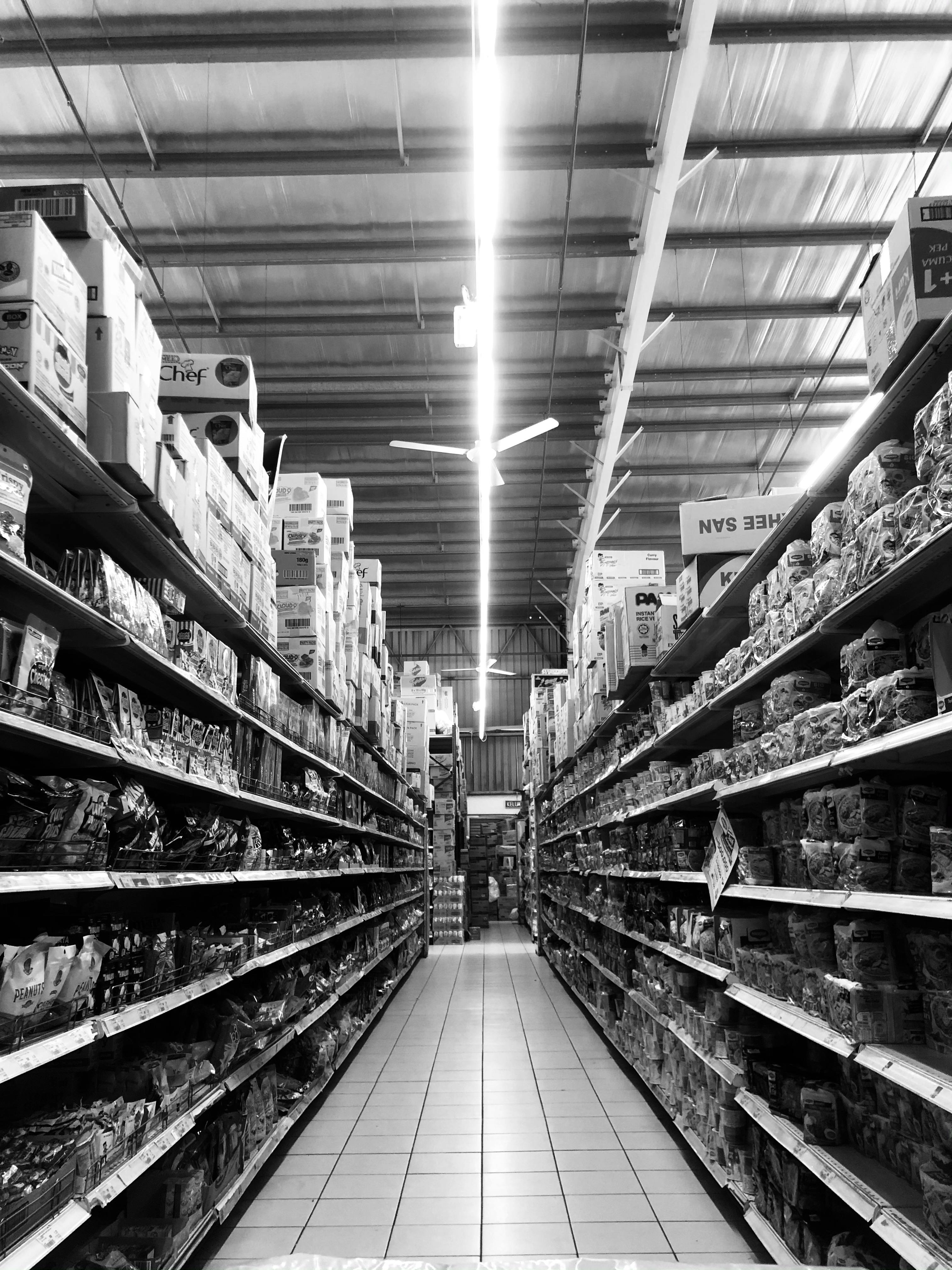 shelves with various products in supermarket