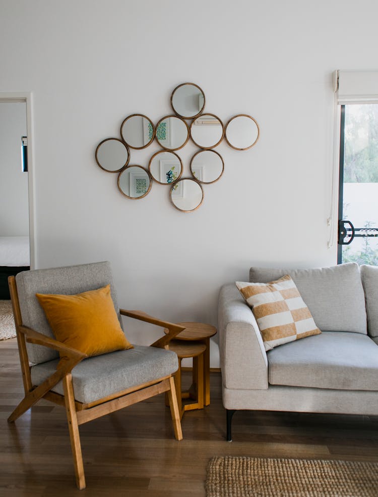 Interior Of Living Room With Sofa And Armchair