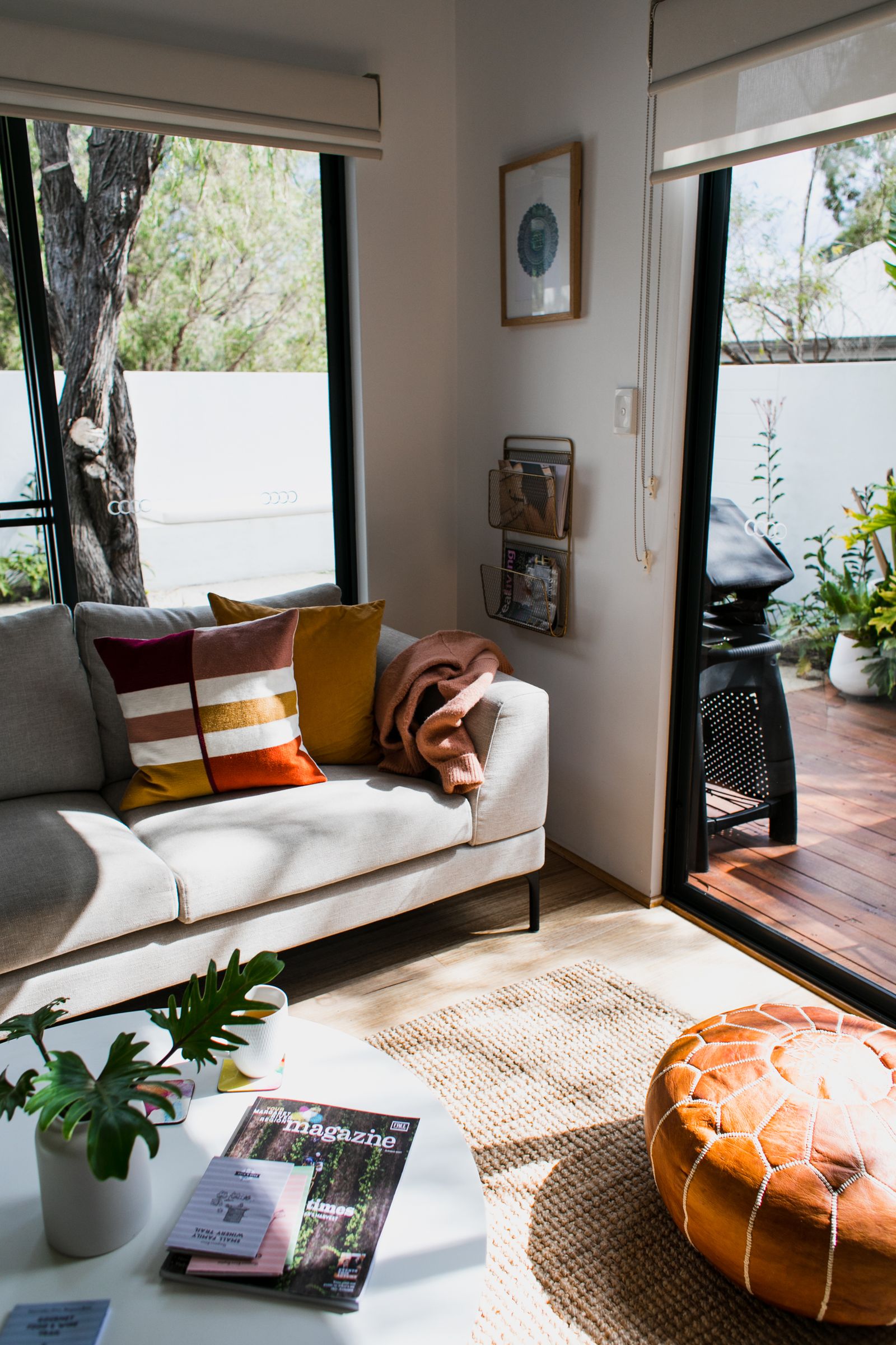 Bright small living room corner with plants