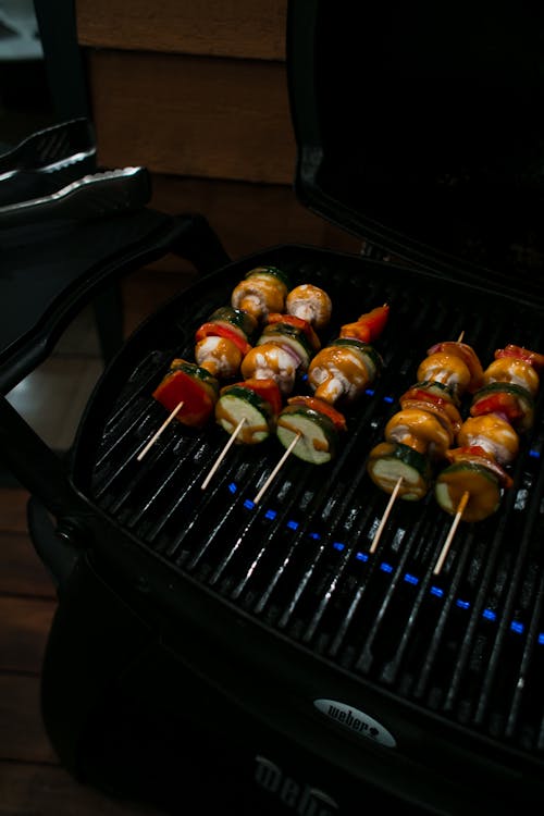 Free From above of delicious healthy vegetables roasting on hot contemporary grill in daytime Stock Photo