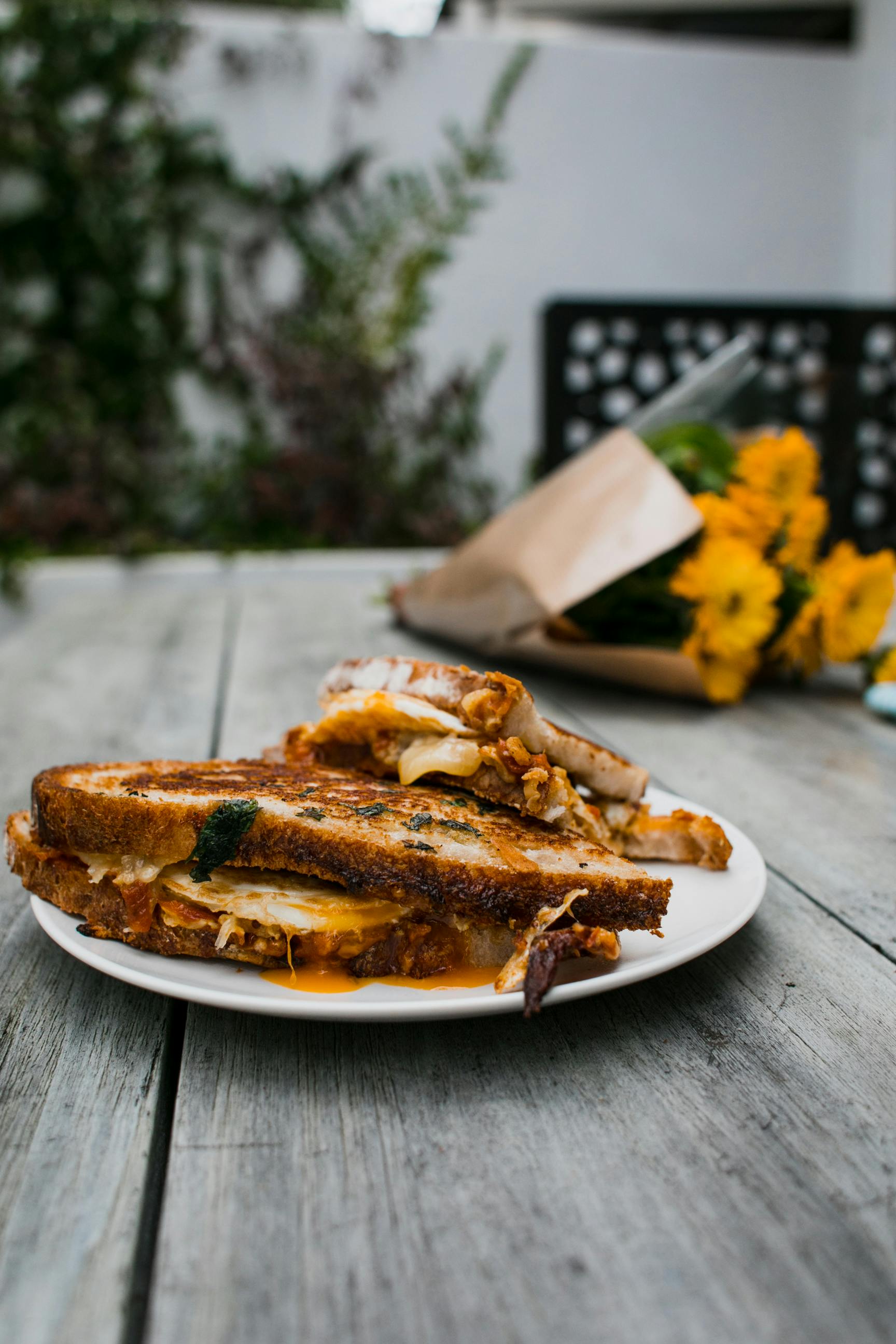 plate with delicious breakfast on wooden table