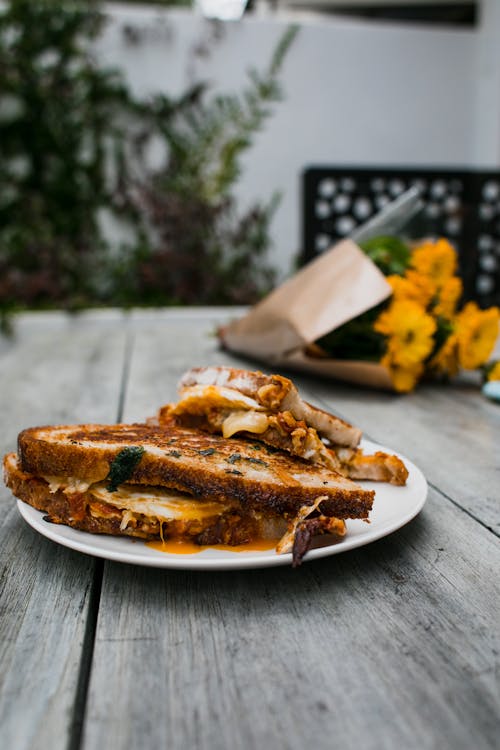 Free Plate with delicious breakfast on wooden table Stock Photo