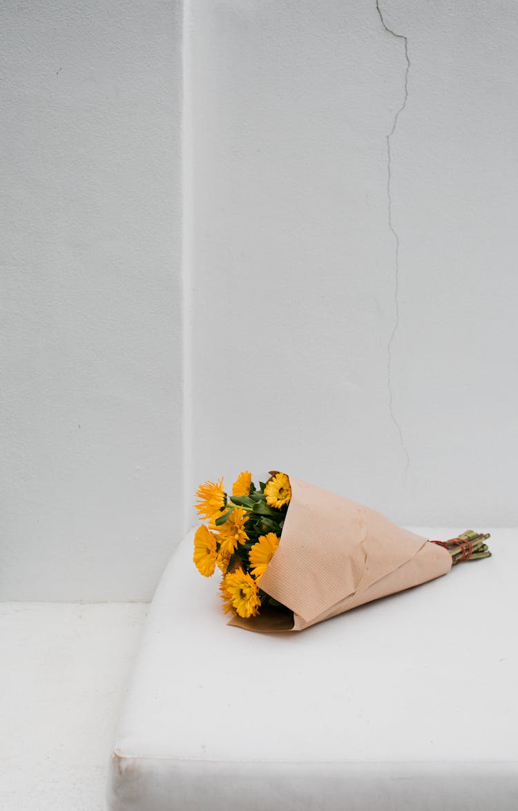 Bright Blossoming Flower Bouquet In Parchment Paper