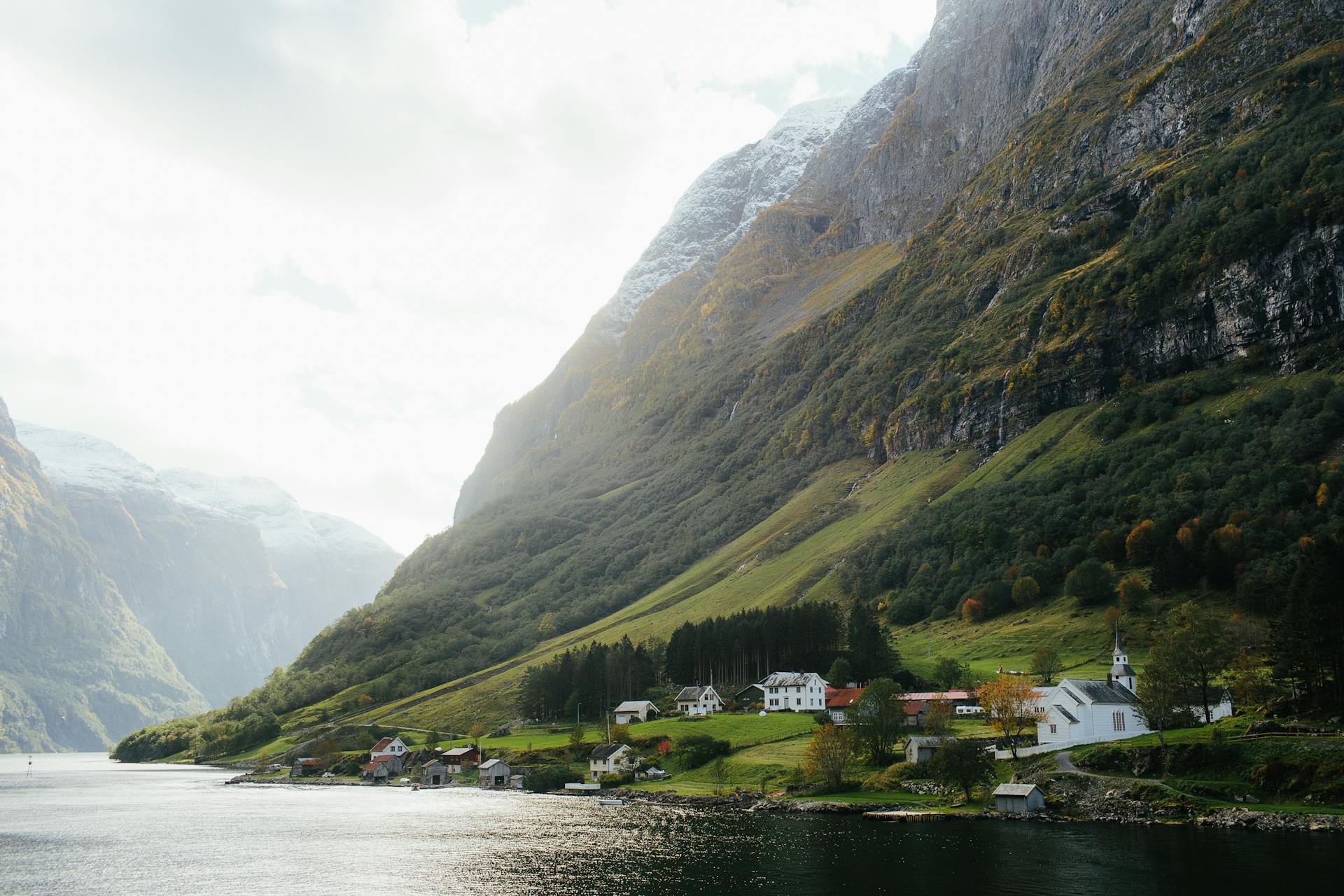 A Village on the Mountain Side Near Body of Water