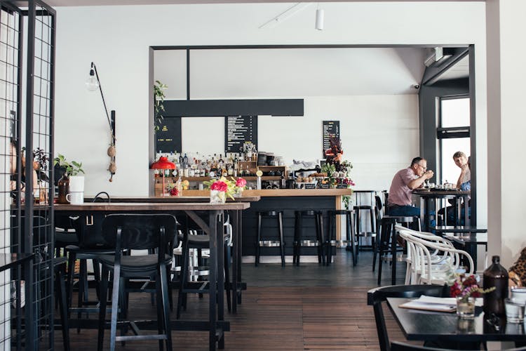 Interior Of Modern Cafe With People