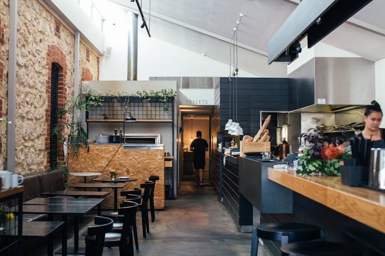 Modern Interior Of Restaurant With People