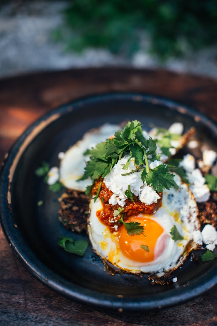 Delicious Breakfast With Fried Eggs In Plate