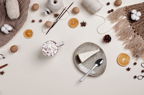 Top View of a Hobby Table with Food and Yarn