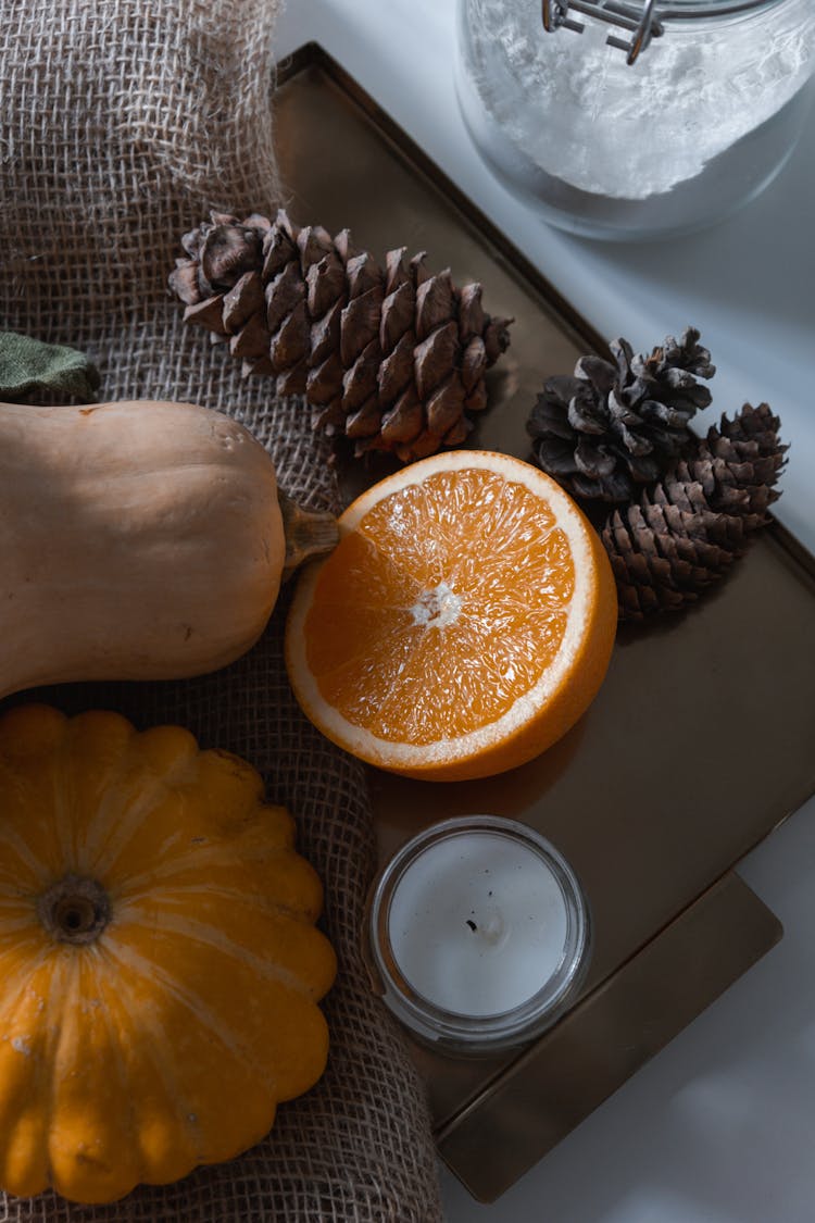 Sliced Orange Fruit Beside Squash