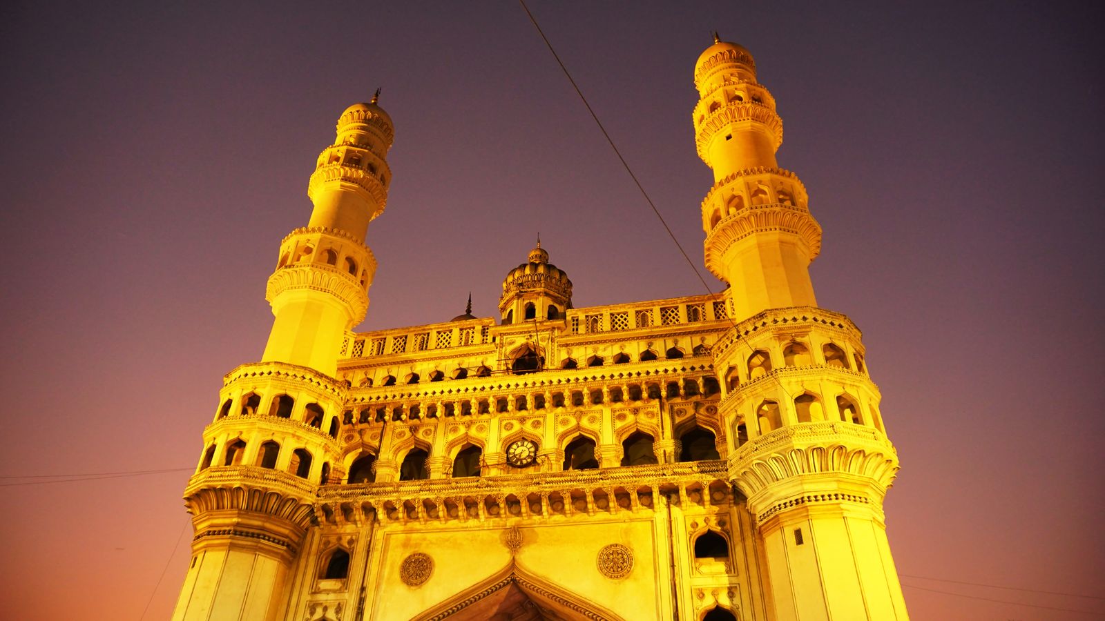 The Charminar at dusk in Hyderabad — the city Plinth Law calls home.