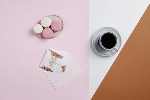 Top View of a Coffee and Macaroons on a Table