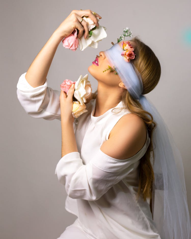 Young Slim Woman With Bandage On Eyes