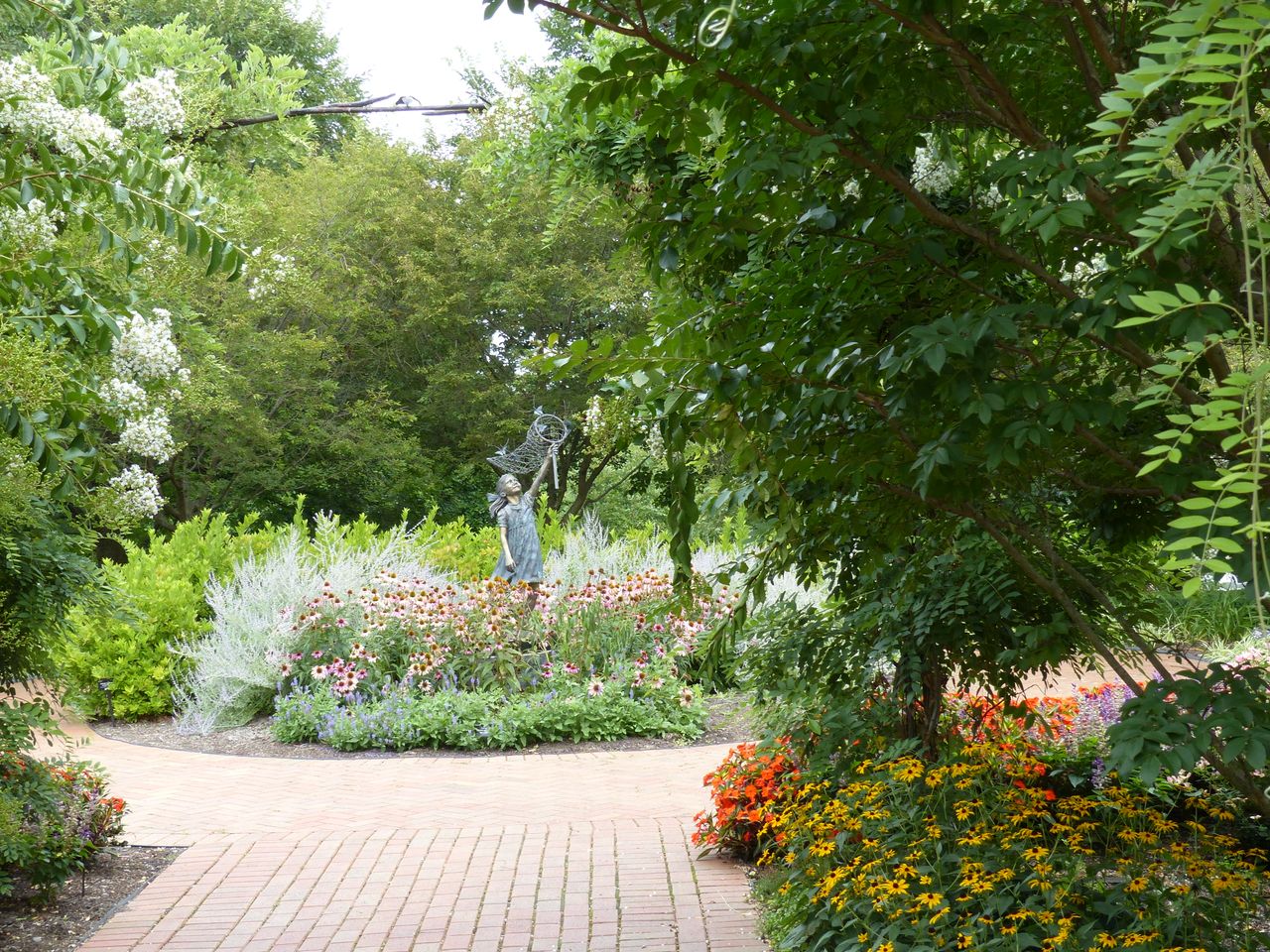 classic-red-brick-edging Brick paving alongside a flower garden
