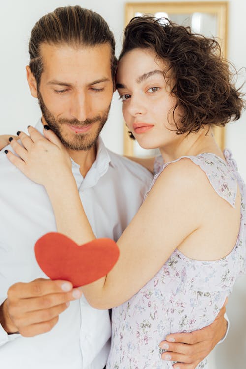 Beautiful Woman Hugging a Man