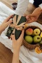 Person Holding a Gift Box