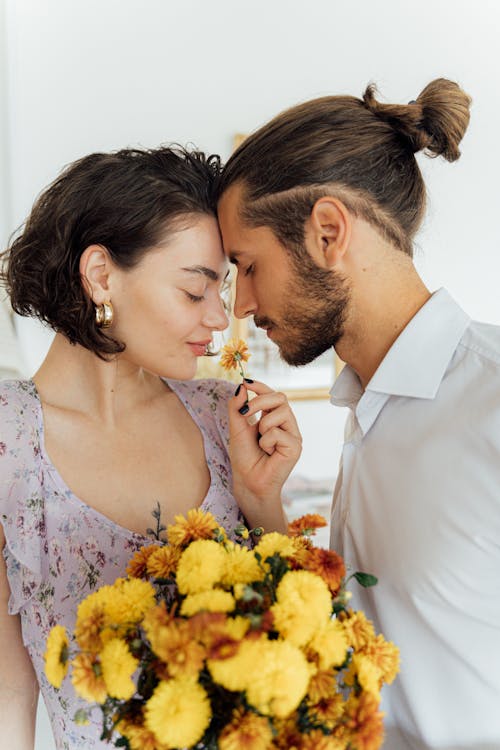 Free Man and Woman Facing Each Other Stock Photo