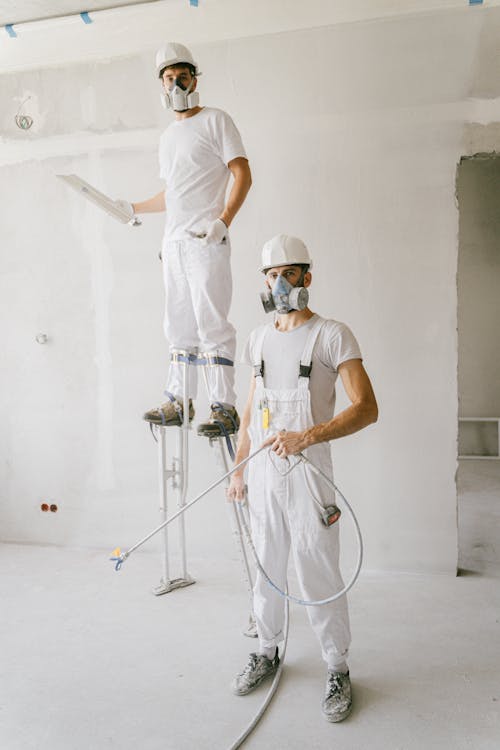 労働者, 垂直ショット, 家の修繕の無料の写真素材