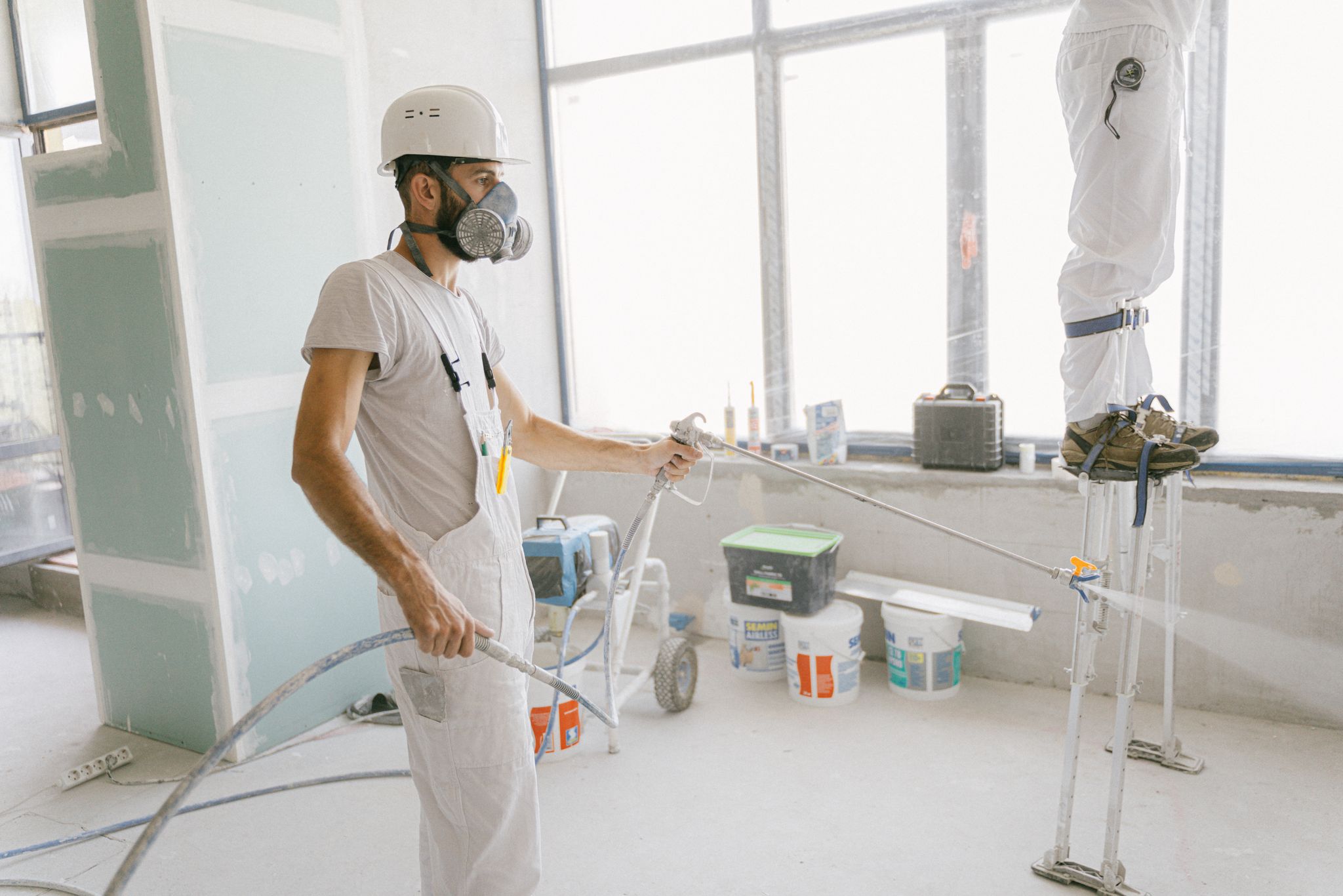 Painter cutting in along trim