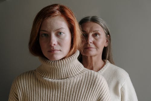 Free Headshot of Mother and Daughter in Sweaters Stock Photo