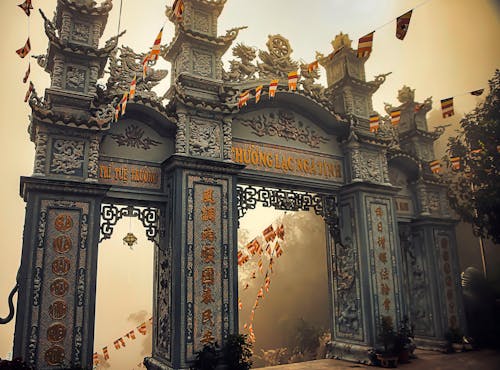 Free Ancient Gateway Filled with Cultural Sculptures  Stock Photo