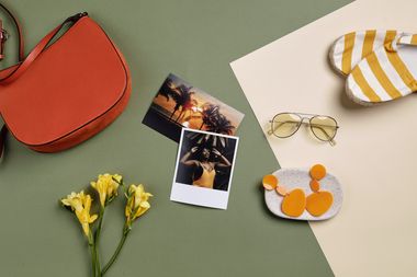 Shoulder bag, prints and sunglasses on olive, photo by Boris Pavlikovsky on Pexels