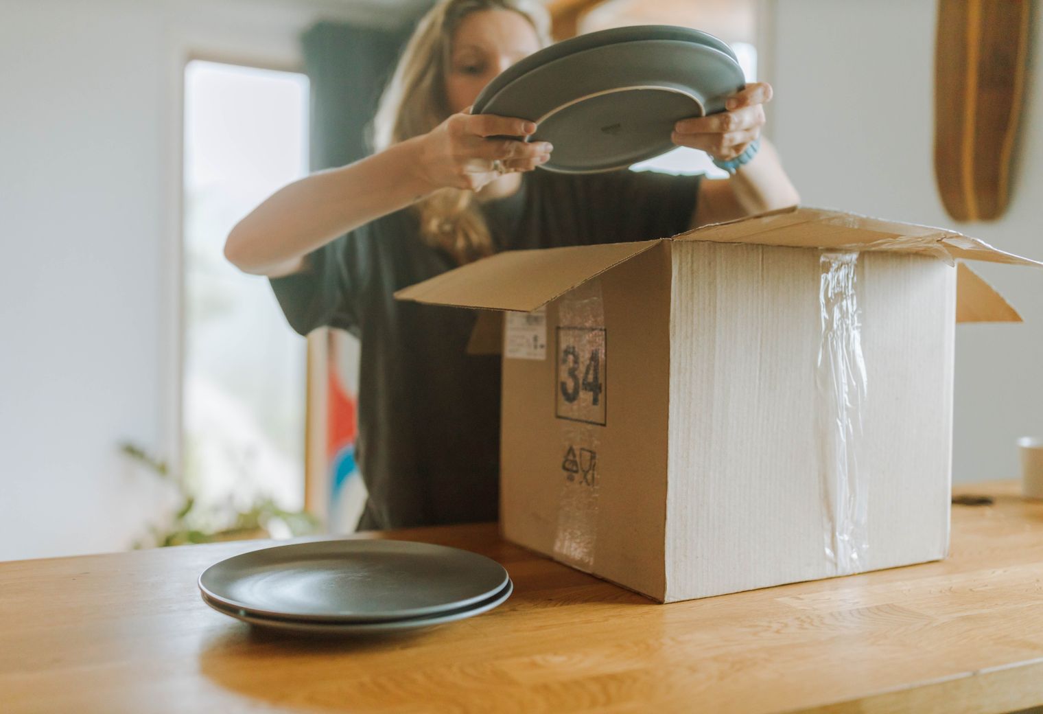 Stratton — professional packers wrapping and boxing belongings