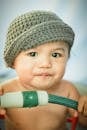 Cute baby boy in knitted hat