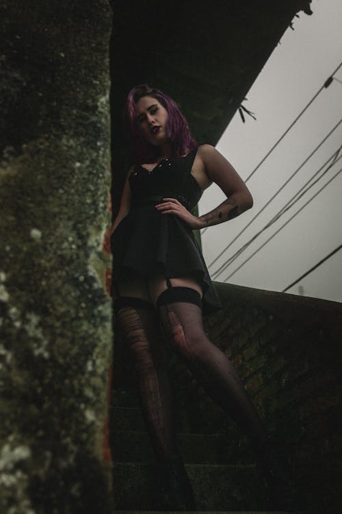 Woman with Purple Hair Posing 