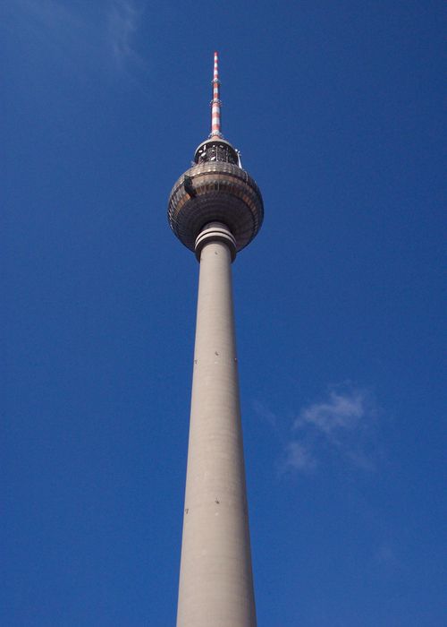 Free Low-angle view of the Berlin TV Tower with a clear blue sky background. Stock Photo
