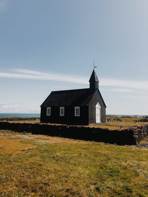 Landscape Photography of a Black Church in Iceland