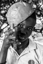 A Boy with a Football on his Head