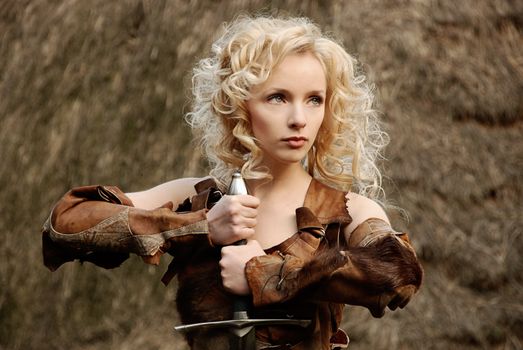 Beautiful Woman Holding a Sword