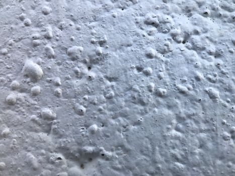 Close up of a Porous Texture of a White Wall