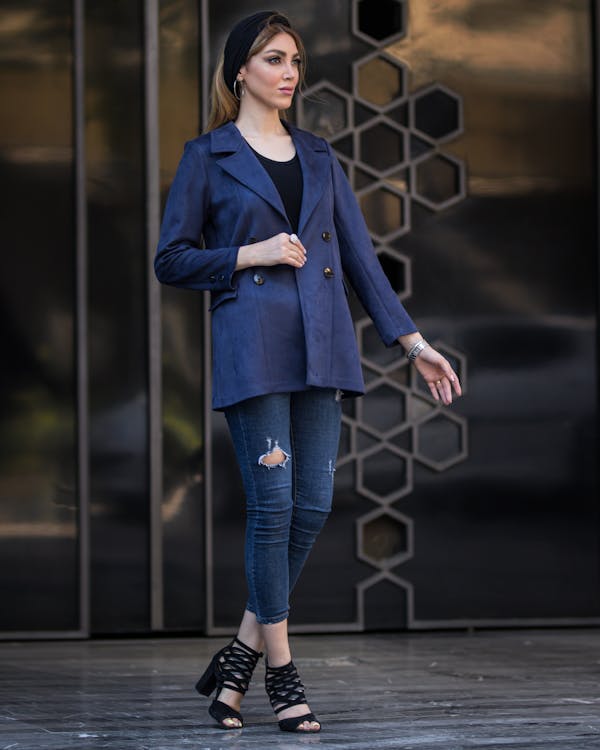 Woman Wearing Blue Blazer and Denim Jeans Standing on Walkway · Free ...