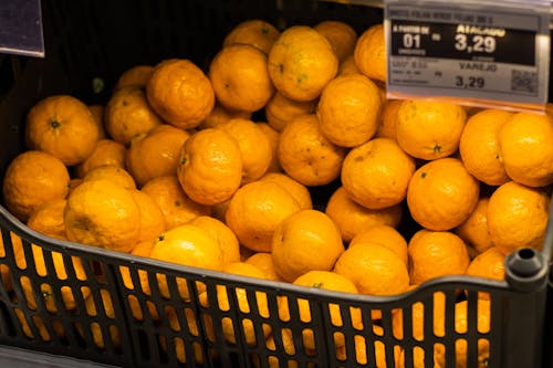 Oranges on Shelf in Supermarket
