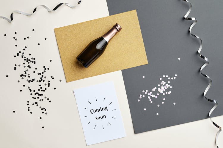 Still Life With Champagne Bottle And Confetti