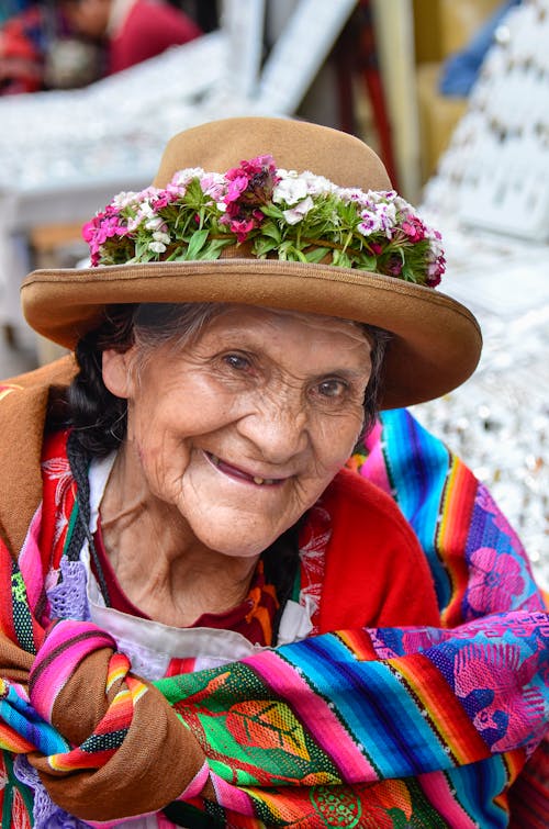 Elderly Woman Wearing a Brown Hat