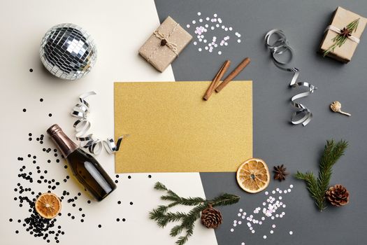 A festive flat lay featuring a disco ball, champagne bottle, gifts, and holiday decorations for a stylish celebration.. pexel