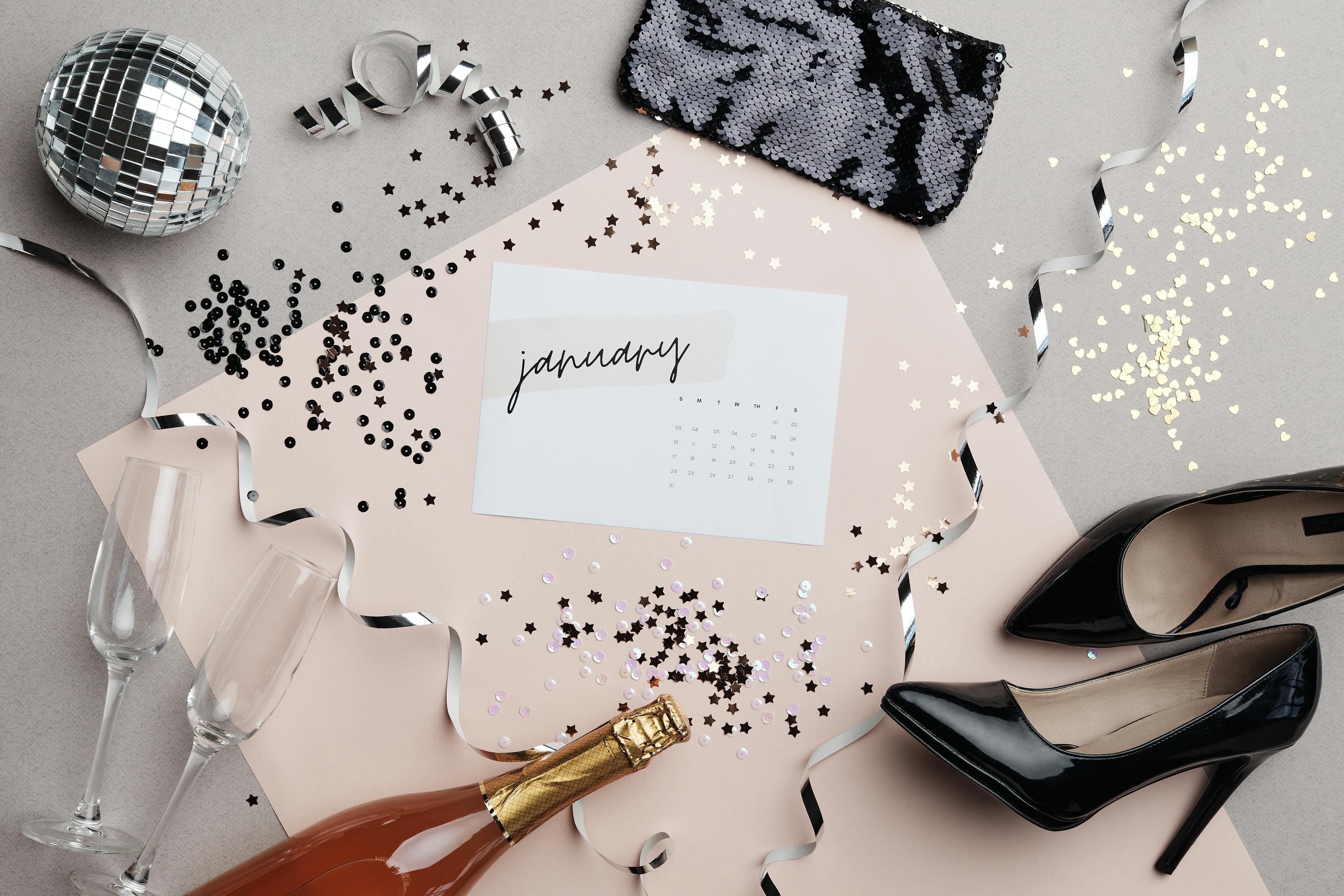 january-calendar-on-glittery-surface-free-stock-photo