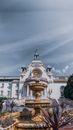 Grand white palace with majestic fountain
