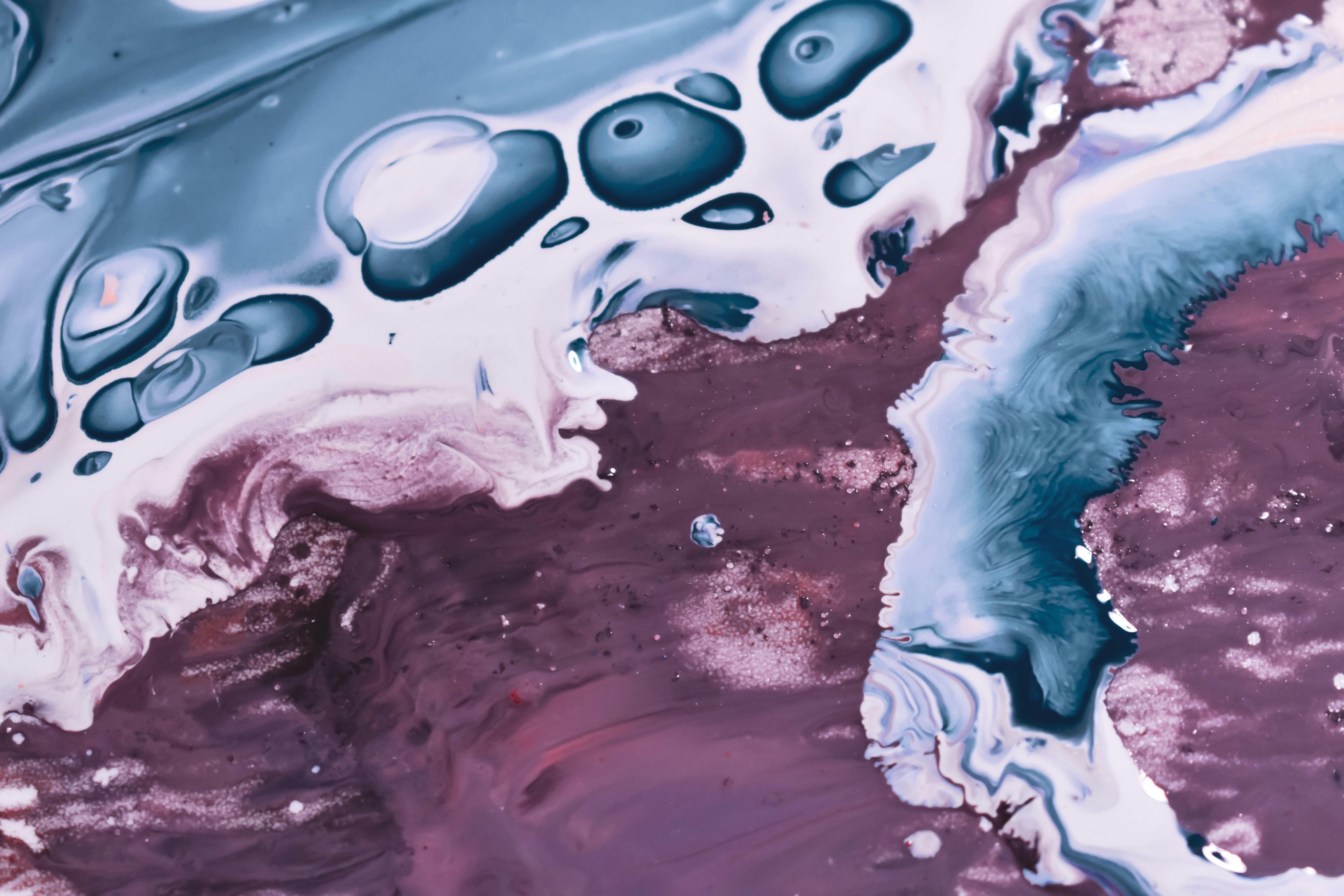 Background of liquid paints mixing and creating abstract pattern ยท Free ...